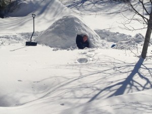 Patrick in the snow fort he built out of 3 feet of snow. 